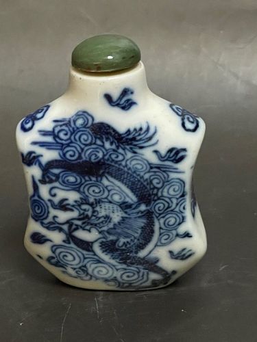 Chinese blue and white porcelain dragon motif snuff bottle.