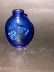 Chinese blue glass inside painted snuff bottle.